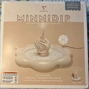 Minnidip Coastal Travertine Swan Inflatable Pool. First Designer Inflatable Pool